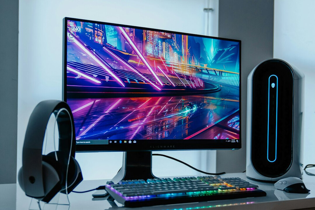Computer monitor displaying colorful data charts and graphs